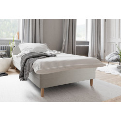 Hotelová čalouněná postel jednolůžková 90x200, vyšší dřevěné nožky, do 170 kg, krémová